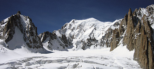 French Alps classics, from left to right: Tour Ronde, Mont Blanc, Grande Capucin (rock spire on right), Pyramid du Tacul (lower rock spire), and Mont Maudit (upper right background).